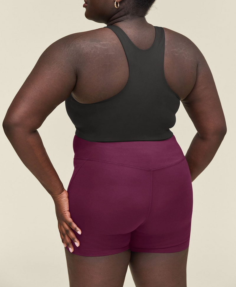 GIRLFRIEND COLLECTIVE High-Rise Run Short in Plum FINAL SALE